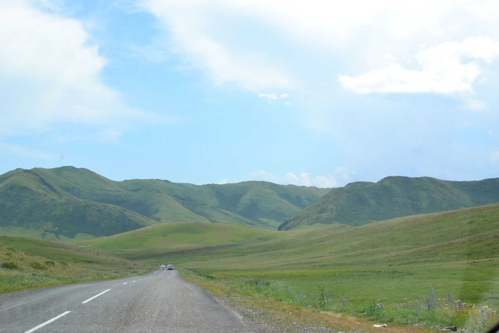 Nikon D3100 sample photo. Road, sky, mountains photography