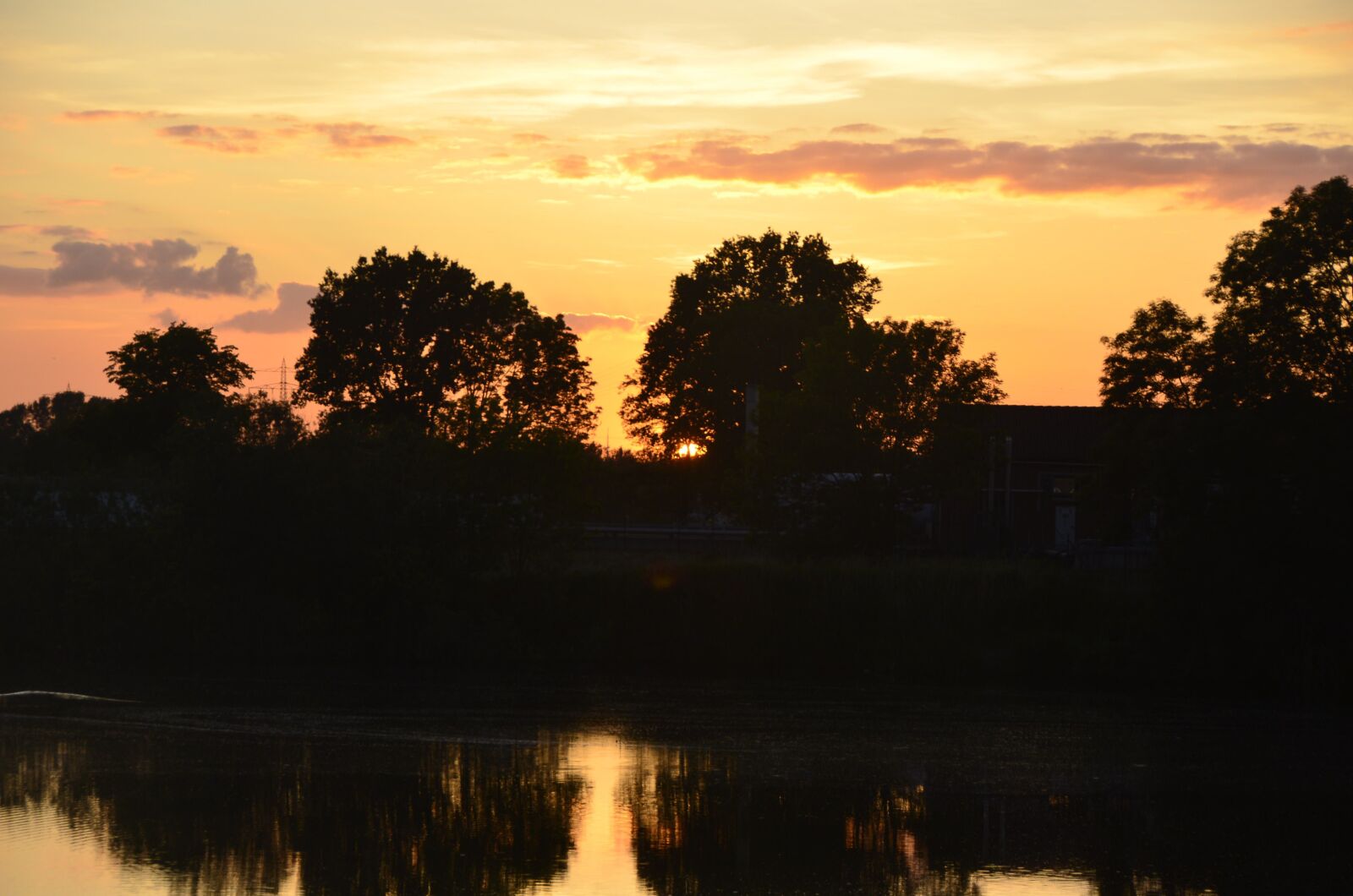 Nikon D5100 sample photo. Sunset, orange sky, clouds photography