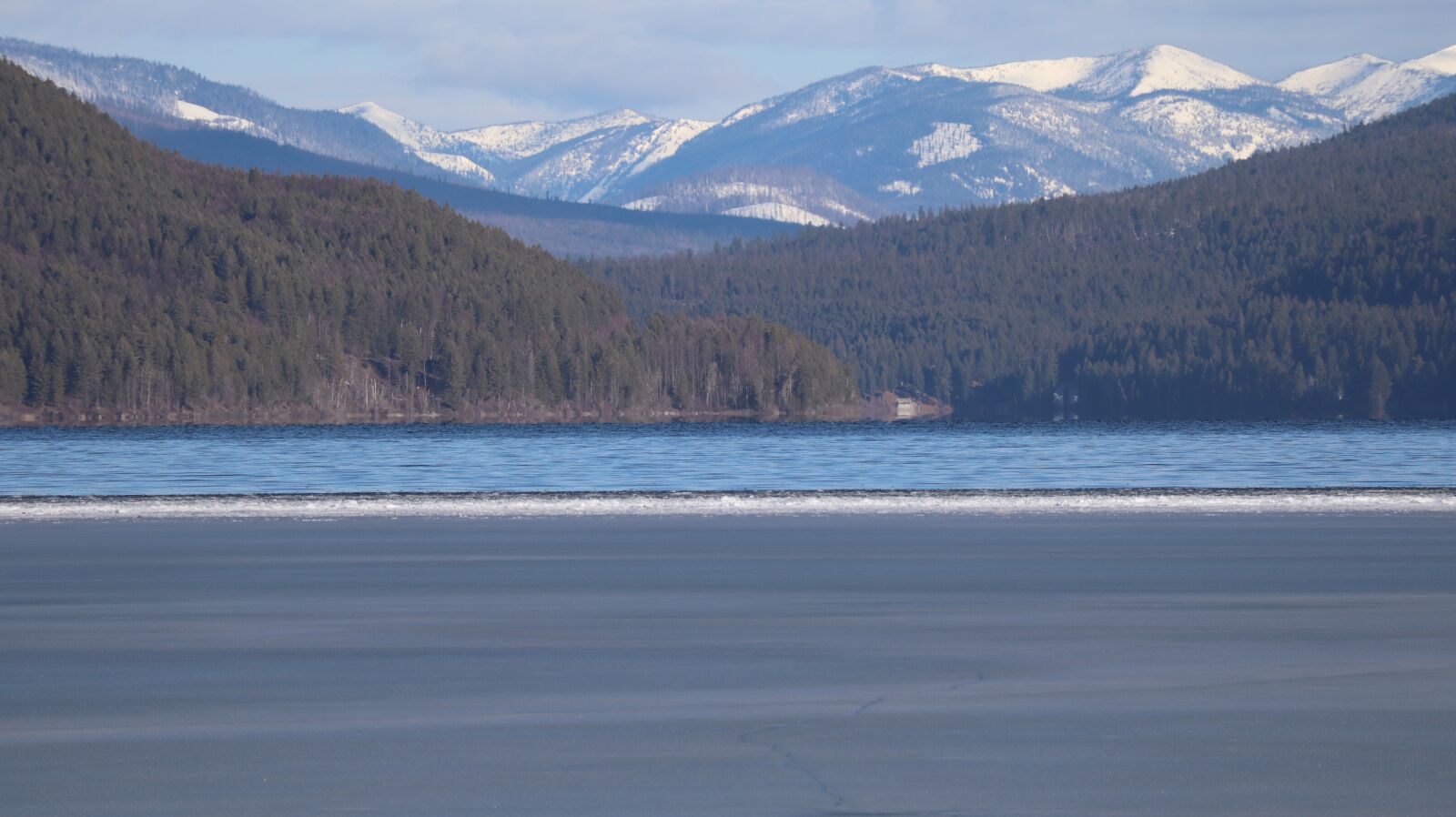 Canon EF-M 55-200mm F4.5-6.3 IS STM sample photo. Whitefish lake, mountains, beach photography