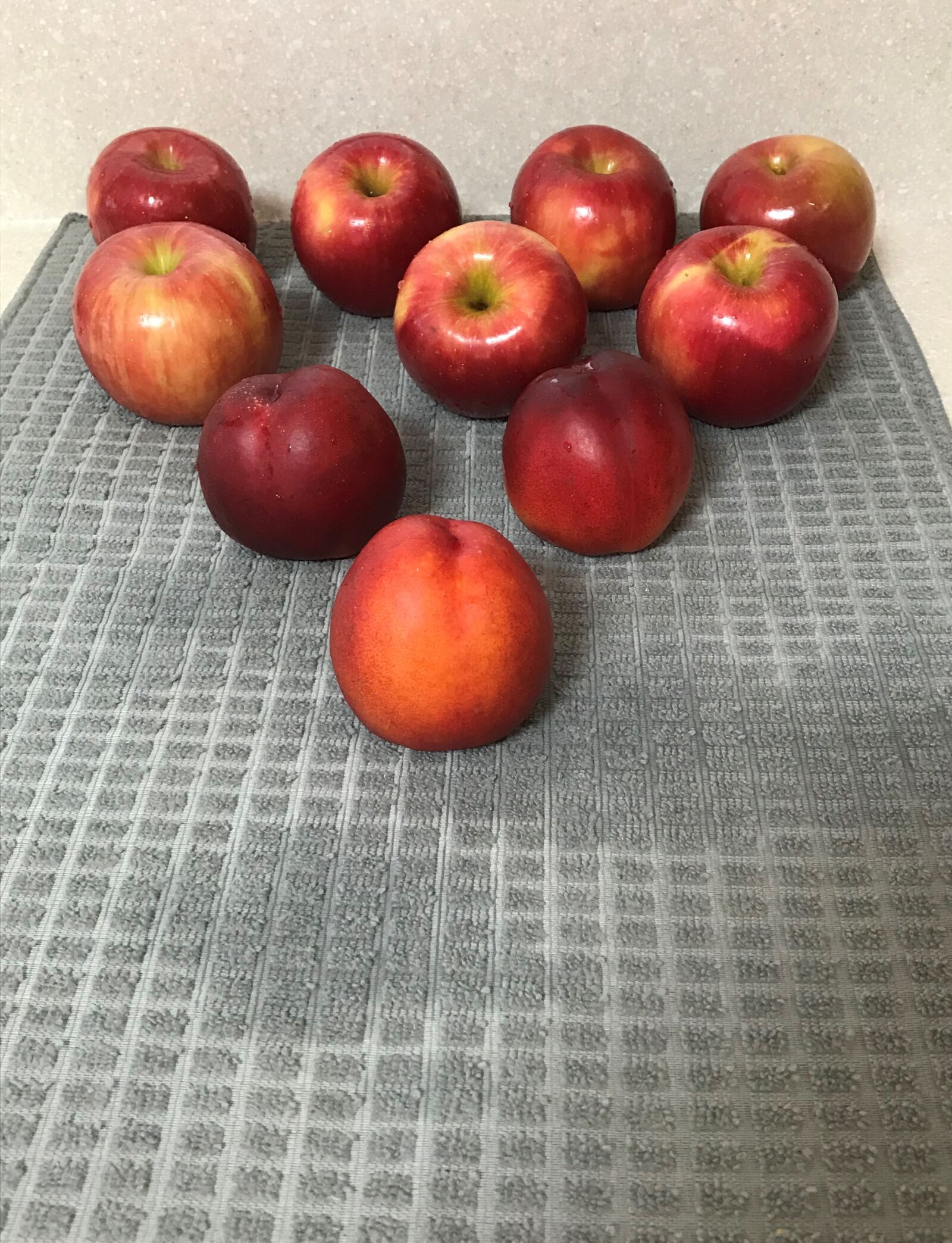iPhone 7 back camera 3.99mm f/1.8 sample photo. Apples, nectarine, bowling photography