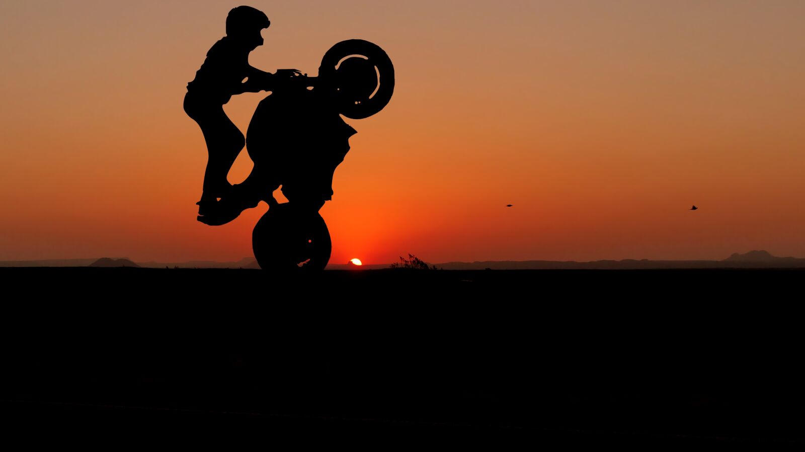 Panasonic Lumix DMC-FZ200 sample photo. Sunset, motorcycle, acrobatics photography