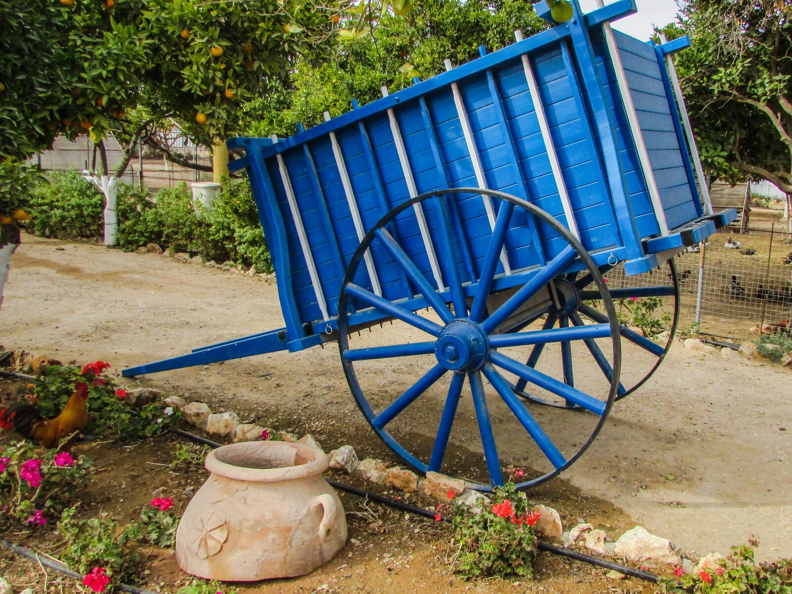 Canon PowerShot SX400 IS sample photo. Wagon, blue, wheel photography