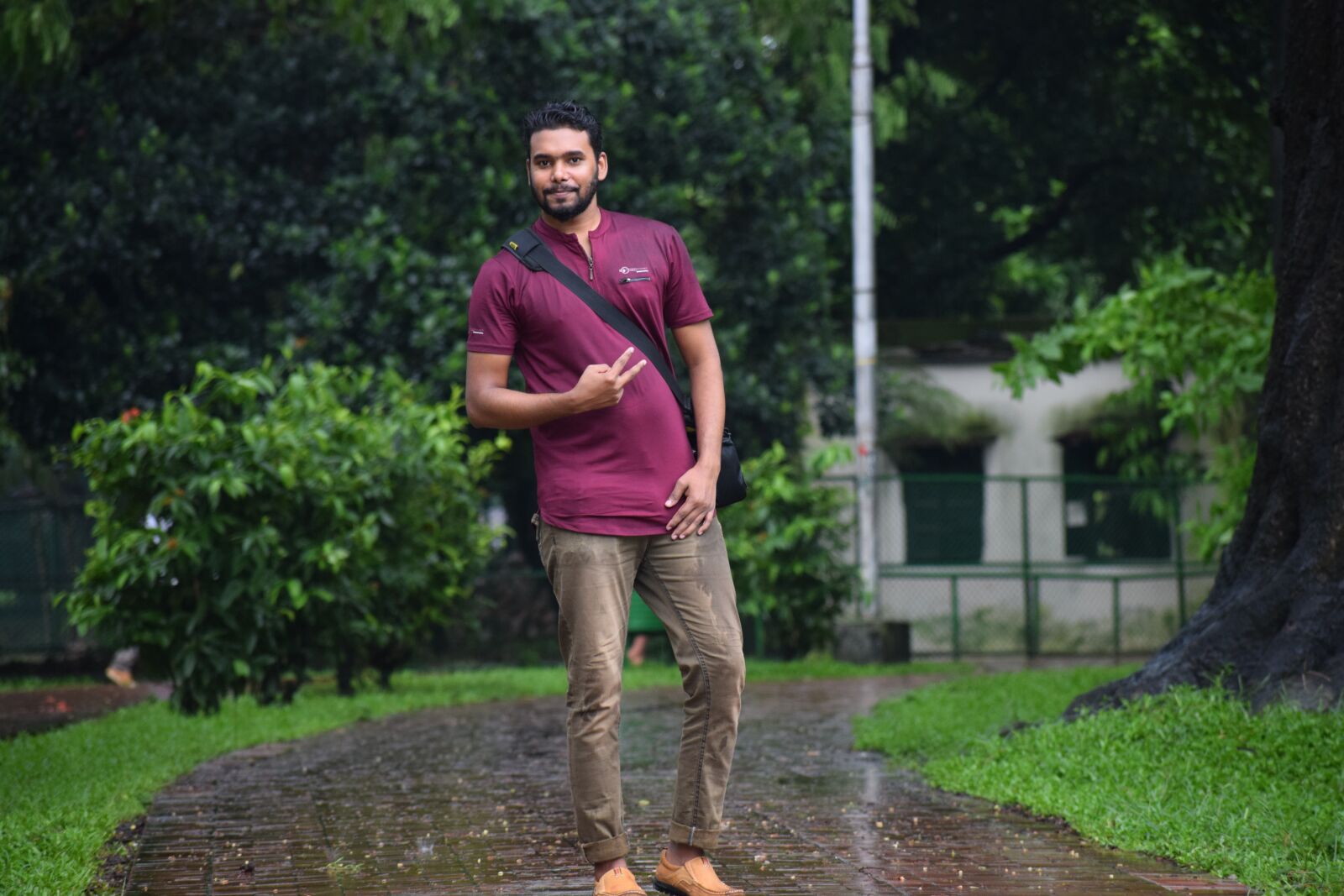 Nikon D5300 sample photo. Rain, outdoor, boy photography