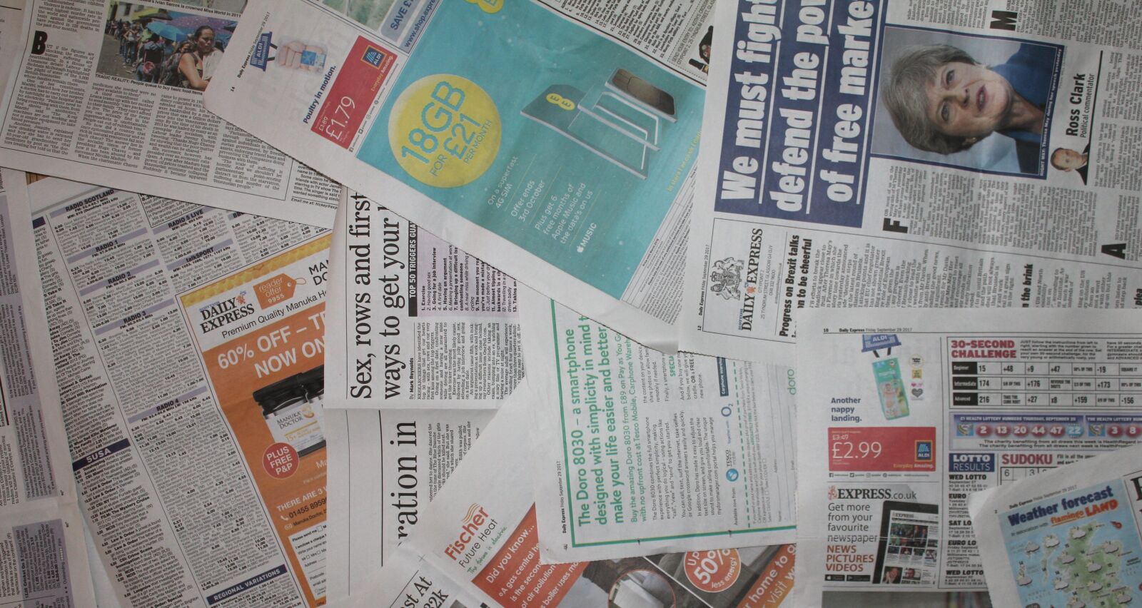 Canon EOS 550D (EOS Rebel T2i / EOS Kiss X4) sample photo. Newspaper, background, layout photography