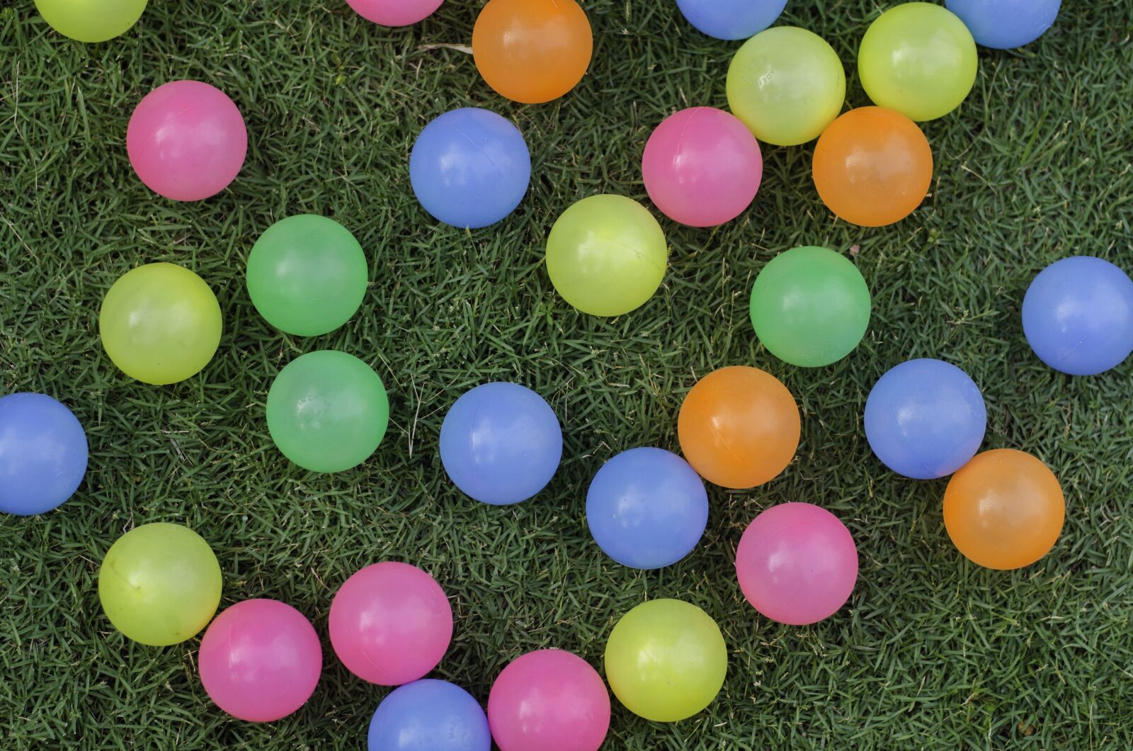 Nikon D7000 sample photo. Colorful balls on grass photography