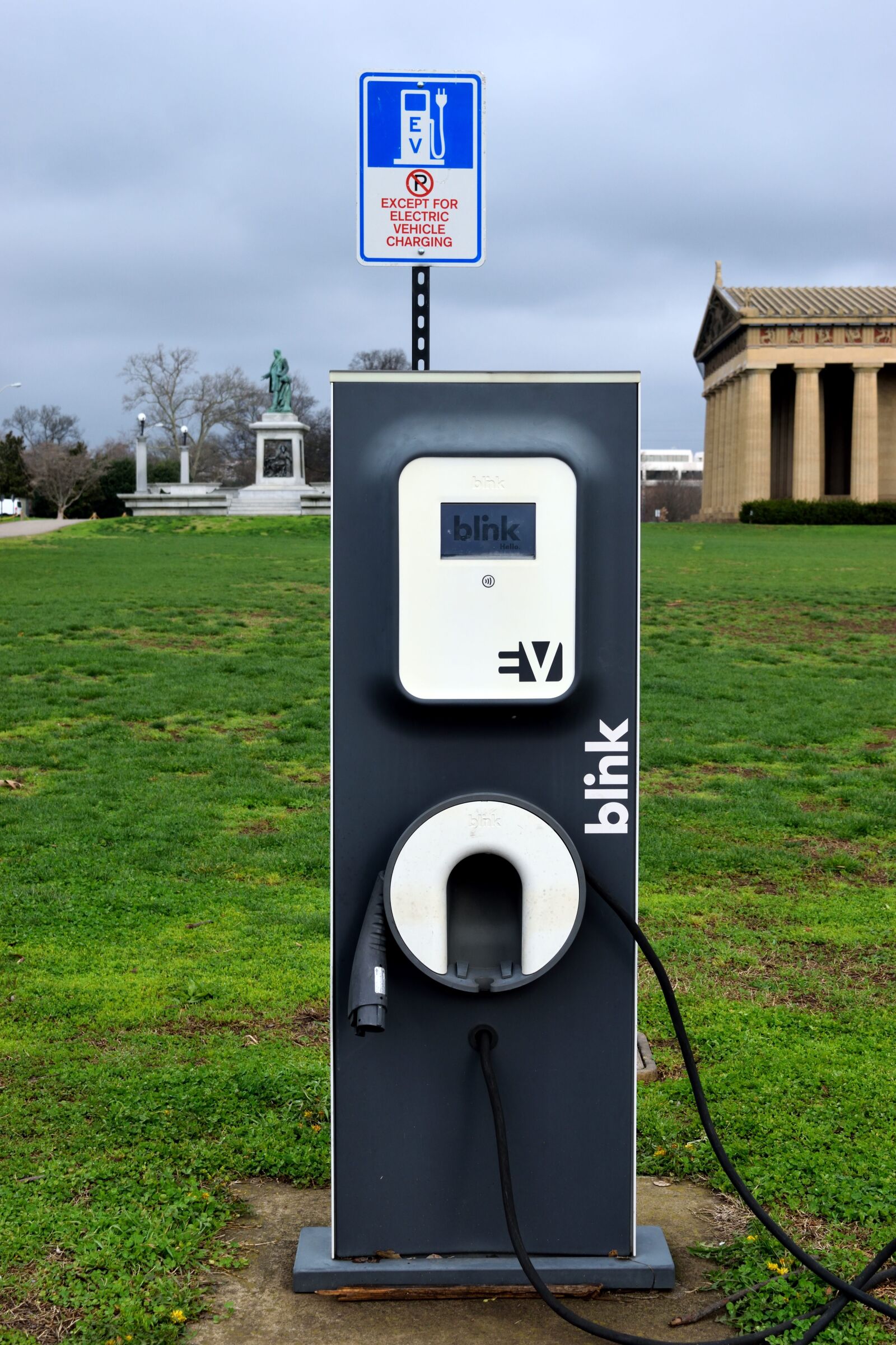 Nikon D3300 sample photo. Hybrid car, sign, charging photography