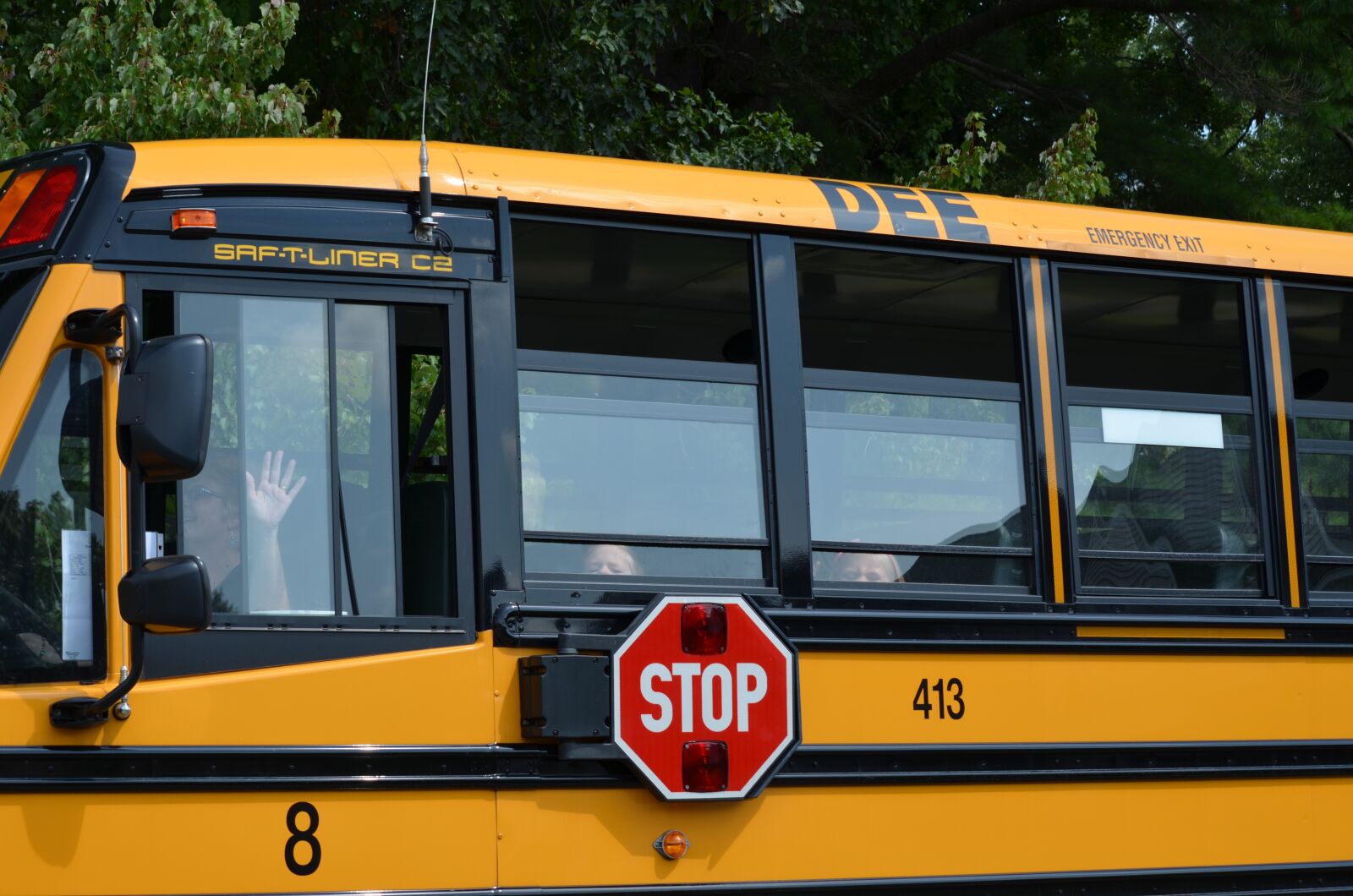 Nikon D5100 sample photo. Bus, wave, school photography