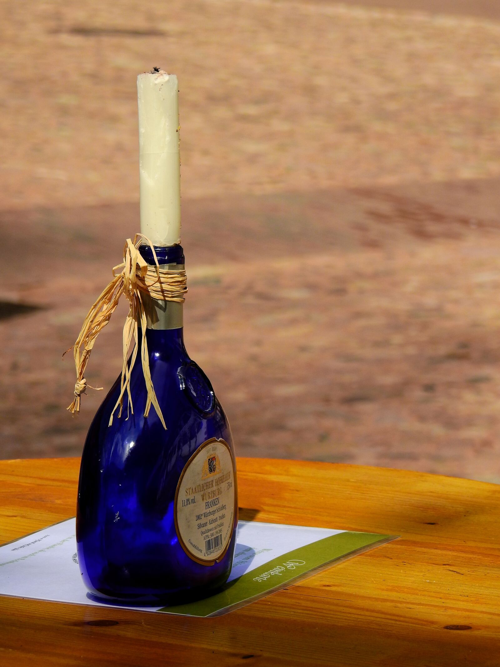 Nikon Coolpix P900 sample photo. Bottle, wine bottle, candle photography