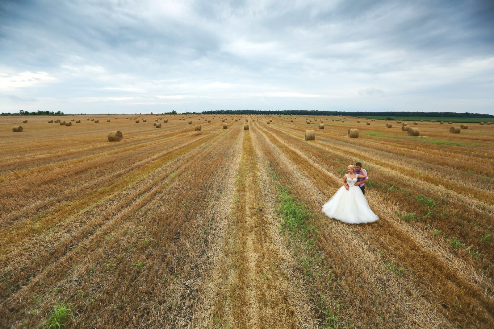 Canon EF 16-35mm F2.8L II USM sample photo. Agriculture, bride, dress, hay photography