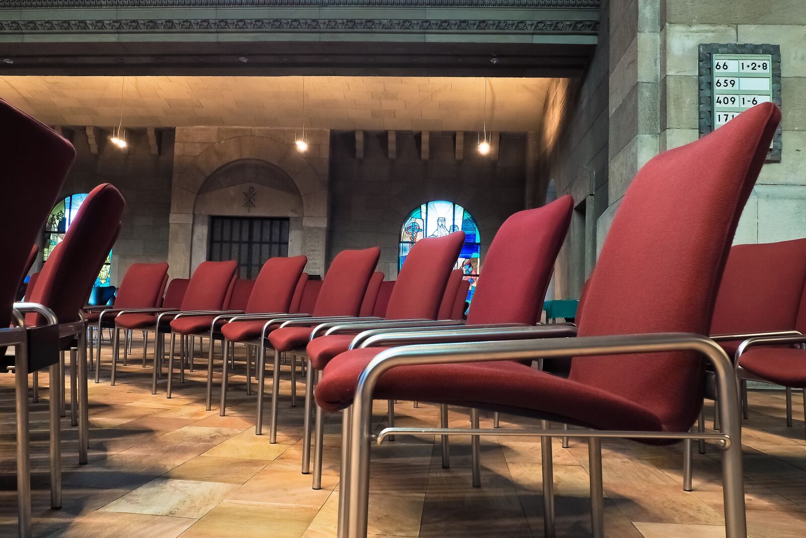 Olympus OM-D E-M10 sample photo. Chairs, church, series photography