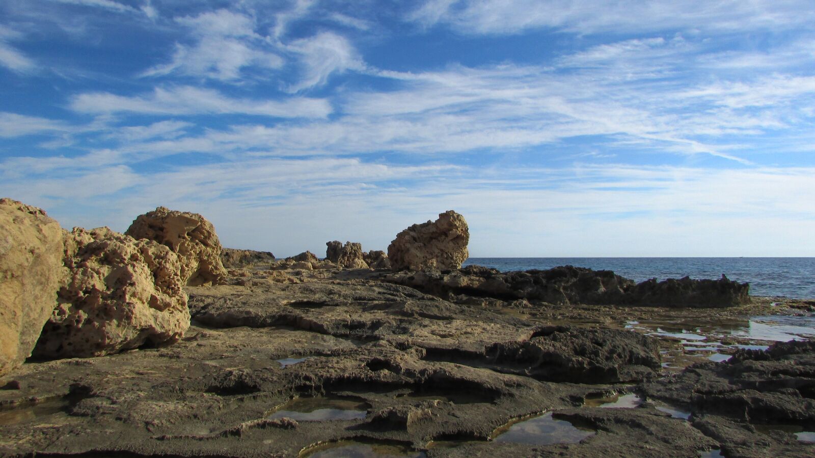 Canon PowerShot SX400 IS sample photo. Rocky coast, formation, geological photography