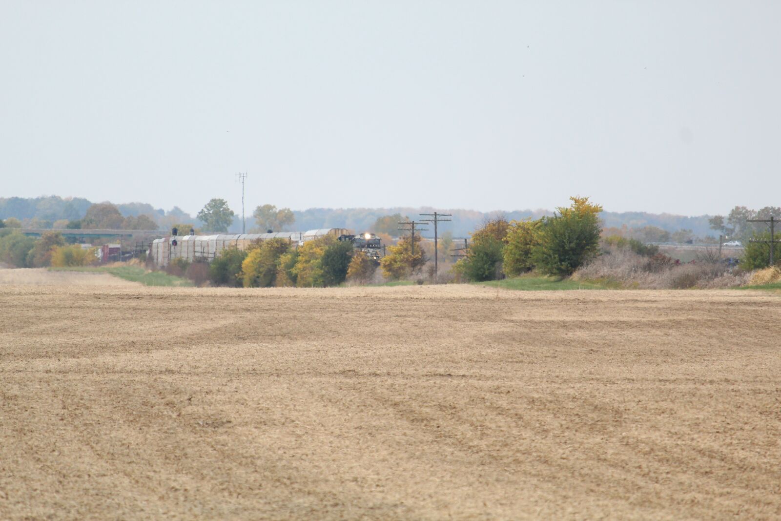 Canon EF-S 55-250mm F4-5.6 IS STM sample photo. Railroad, farm, field photography
