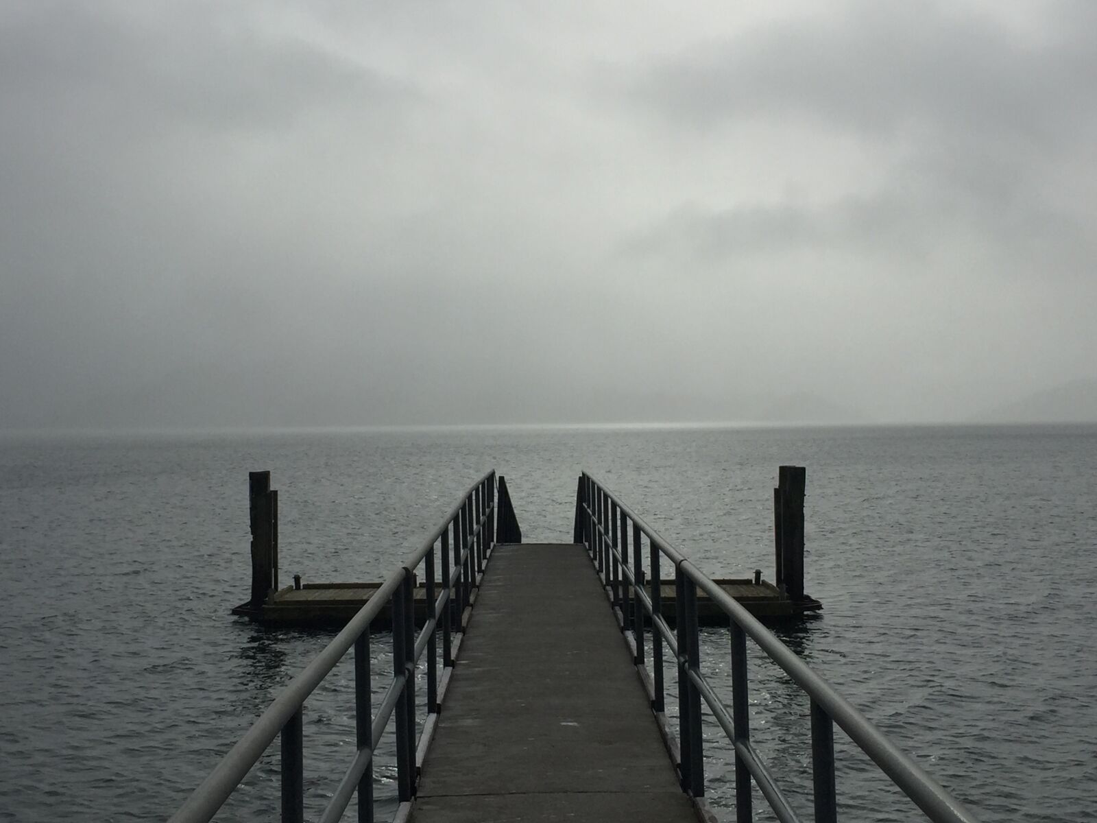 Apple iPhone 6 sample photo. Cloudy, sea, pontoon photography