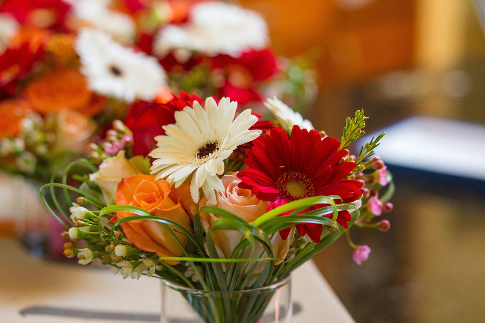 Canon EF 85mm F1.8 USM sample photo. Flowers, bouquet, red photography