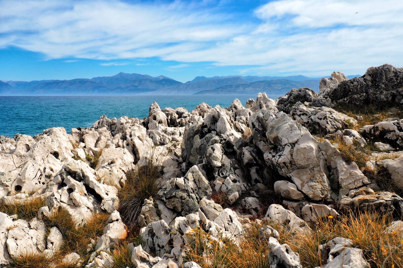 Olympus OM-D E-M10 sample photo. Island, sea, rocks photography