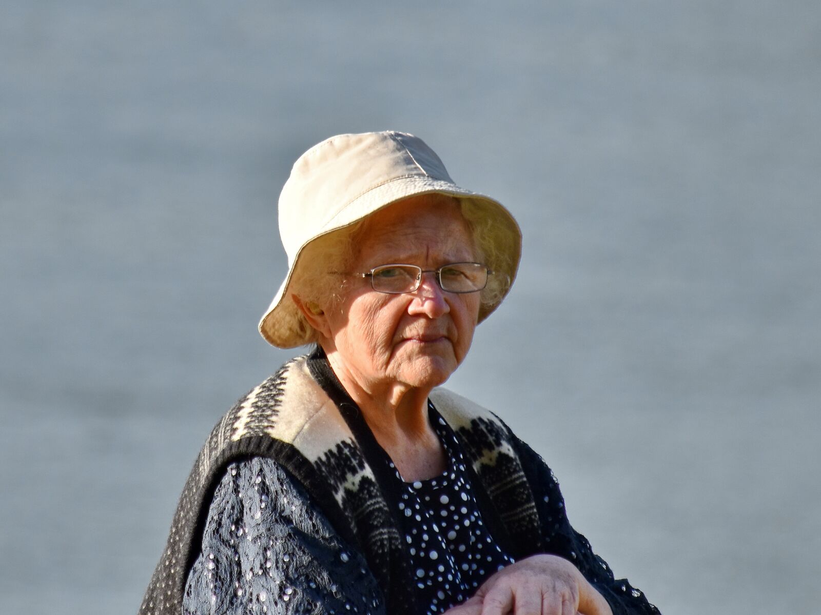 Nikon D5500 sample photo. Eyeglasses, grandmother, hands, hat photography