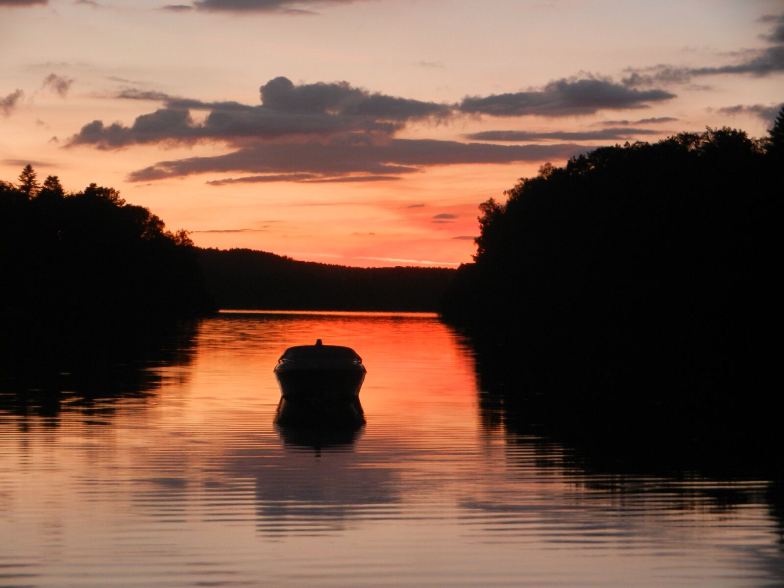 Nikon Coolpix S9100 sample photo. Sunset, lake, boat photography