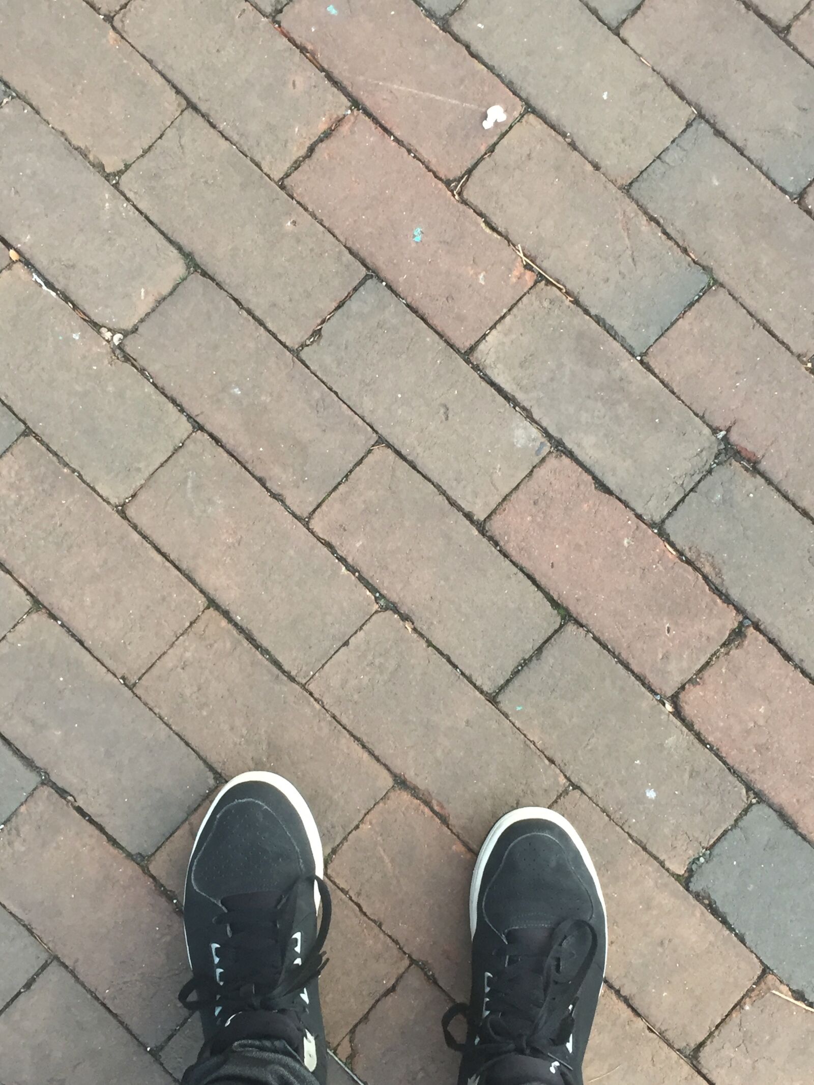 Apple iPhone 6 sample photo. Brick, feet, shoes, sneakers photography