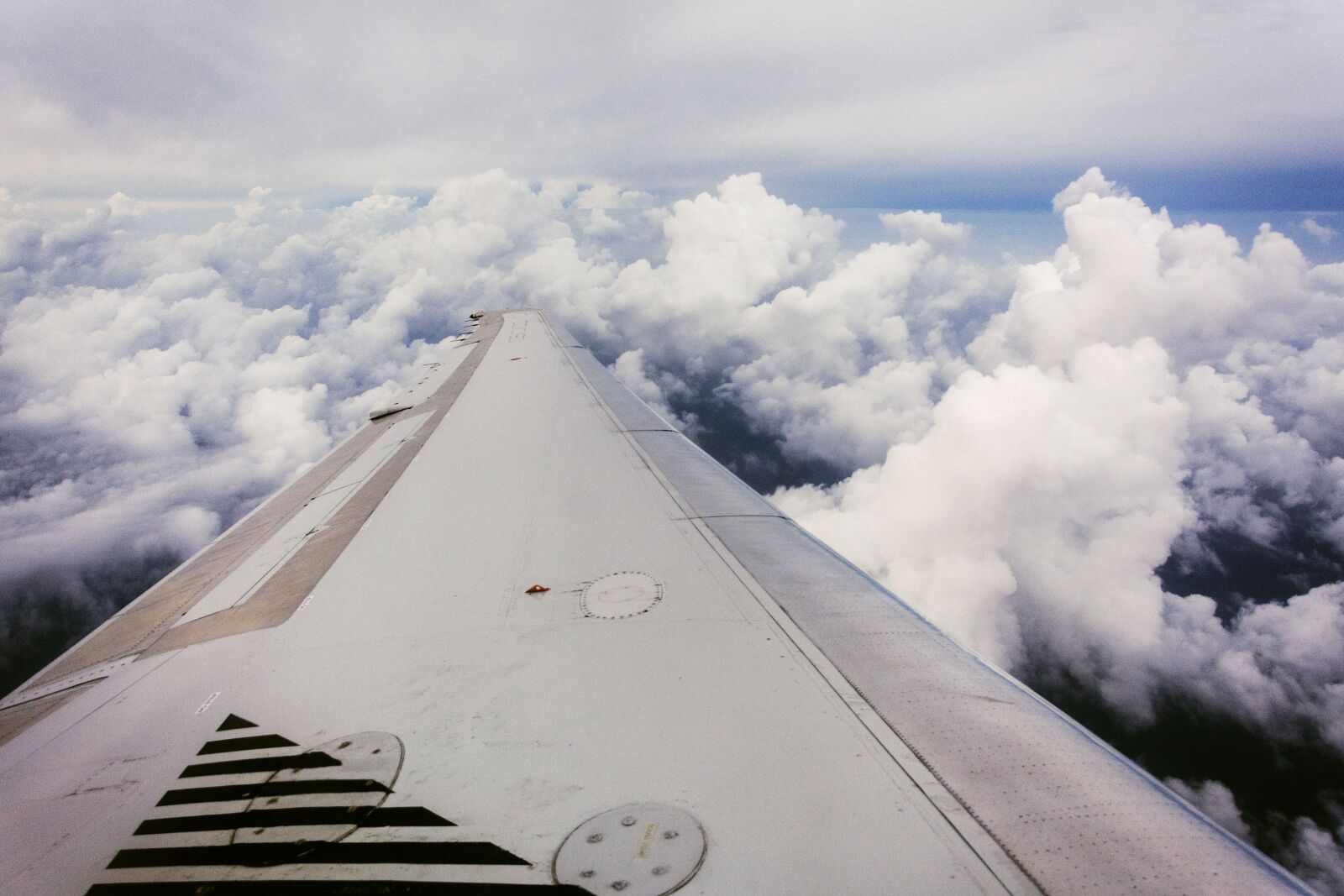 Nikon D7100 sample photo. Plane, wing, clouds photography