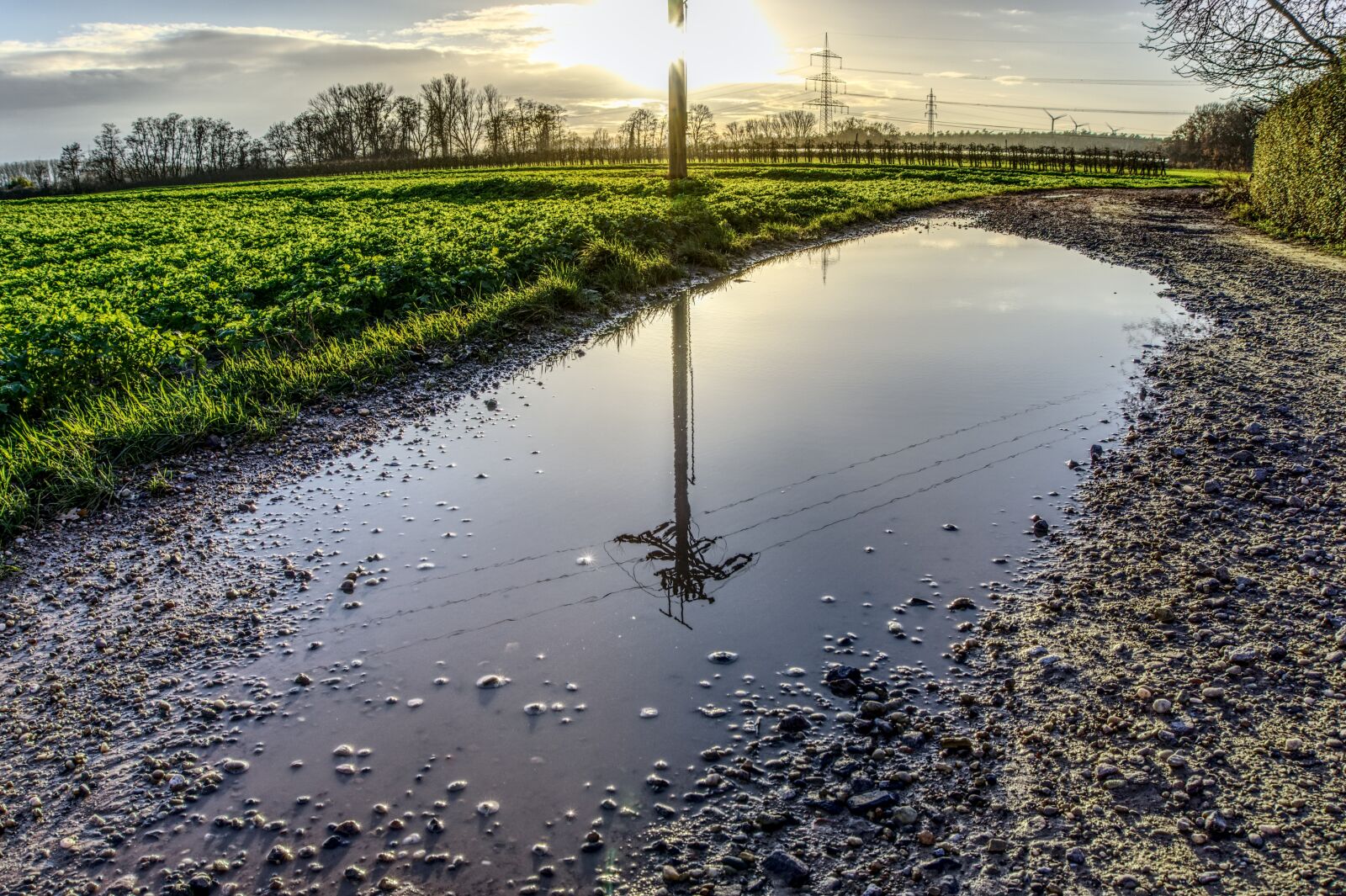 Sony a6000 sample photo. Mirroring, strommast, power line photography