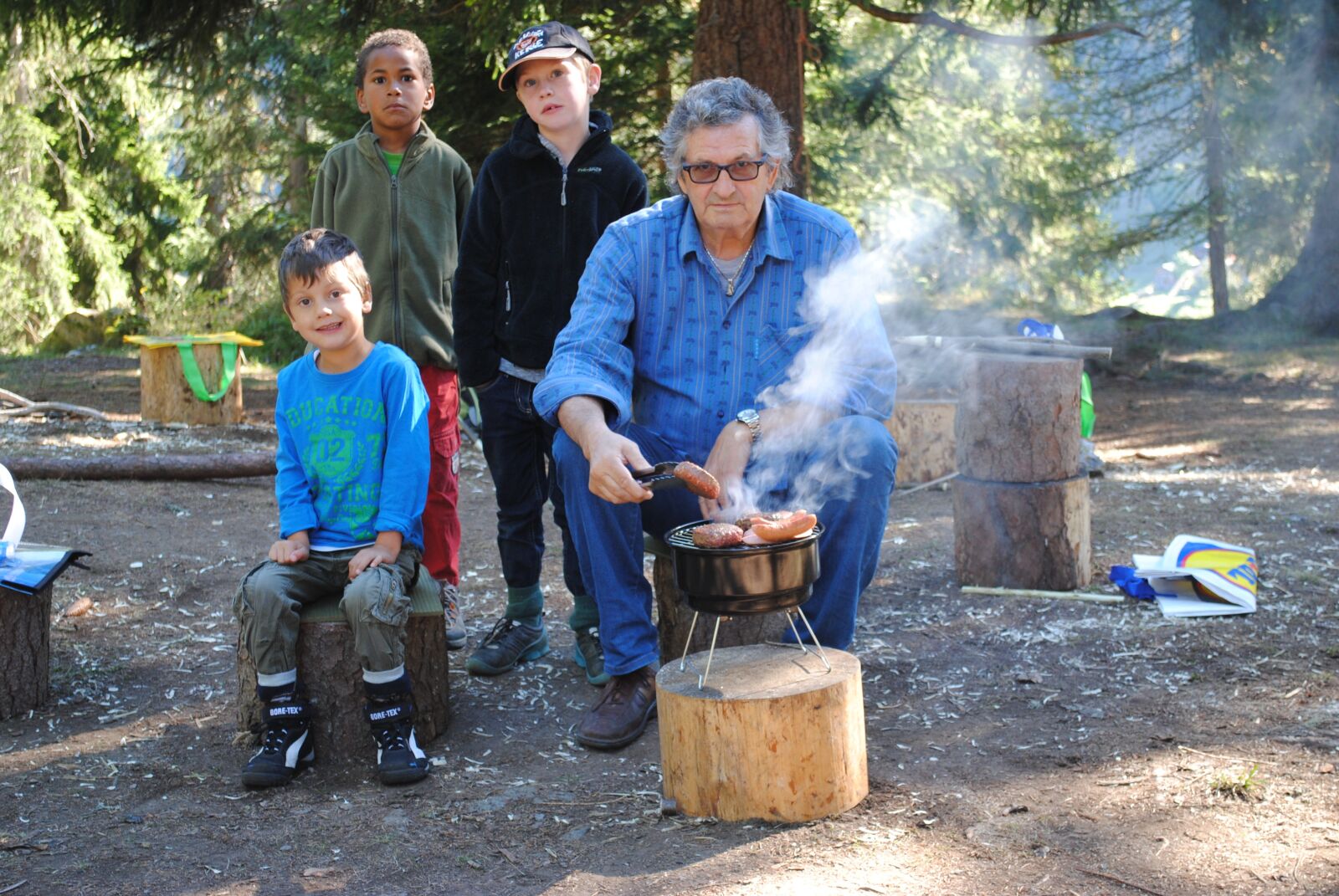 Nikon D3000 sample photo. Men, smoke, grill photography