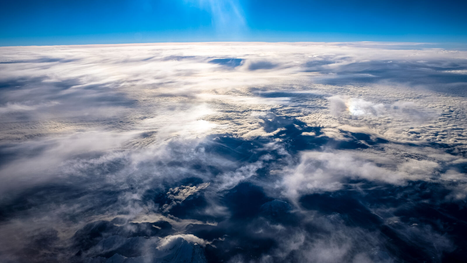 Fujifilm X-E2 sample photo. Sky, flying, clouds, earth photography