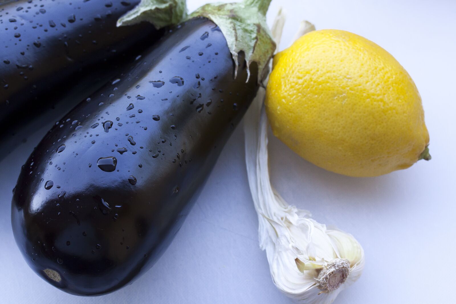 Canon EOS 50D sample photo. Eggplant, lemon, garlic photography