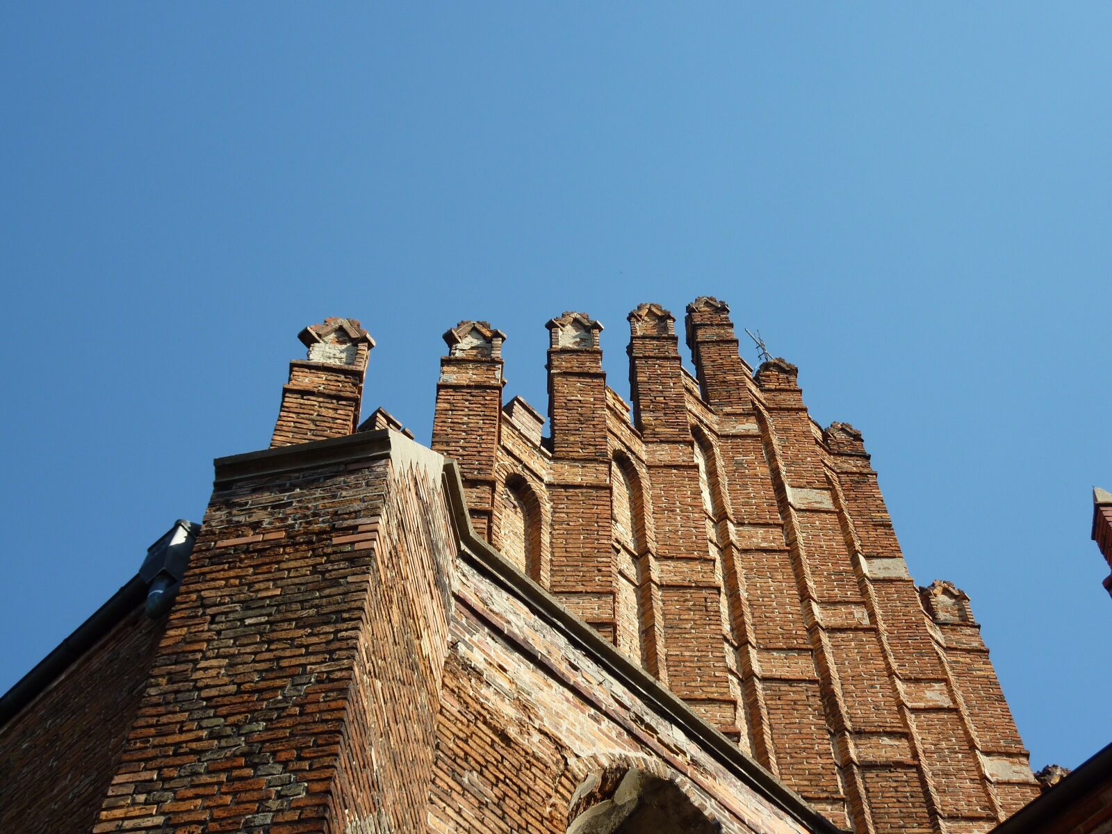 Panasonic DMC-TZ7 sample photo. Brick, façades, top photography