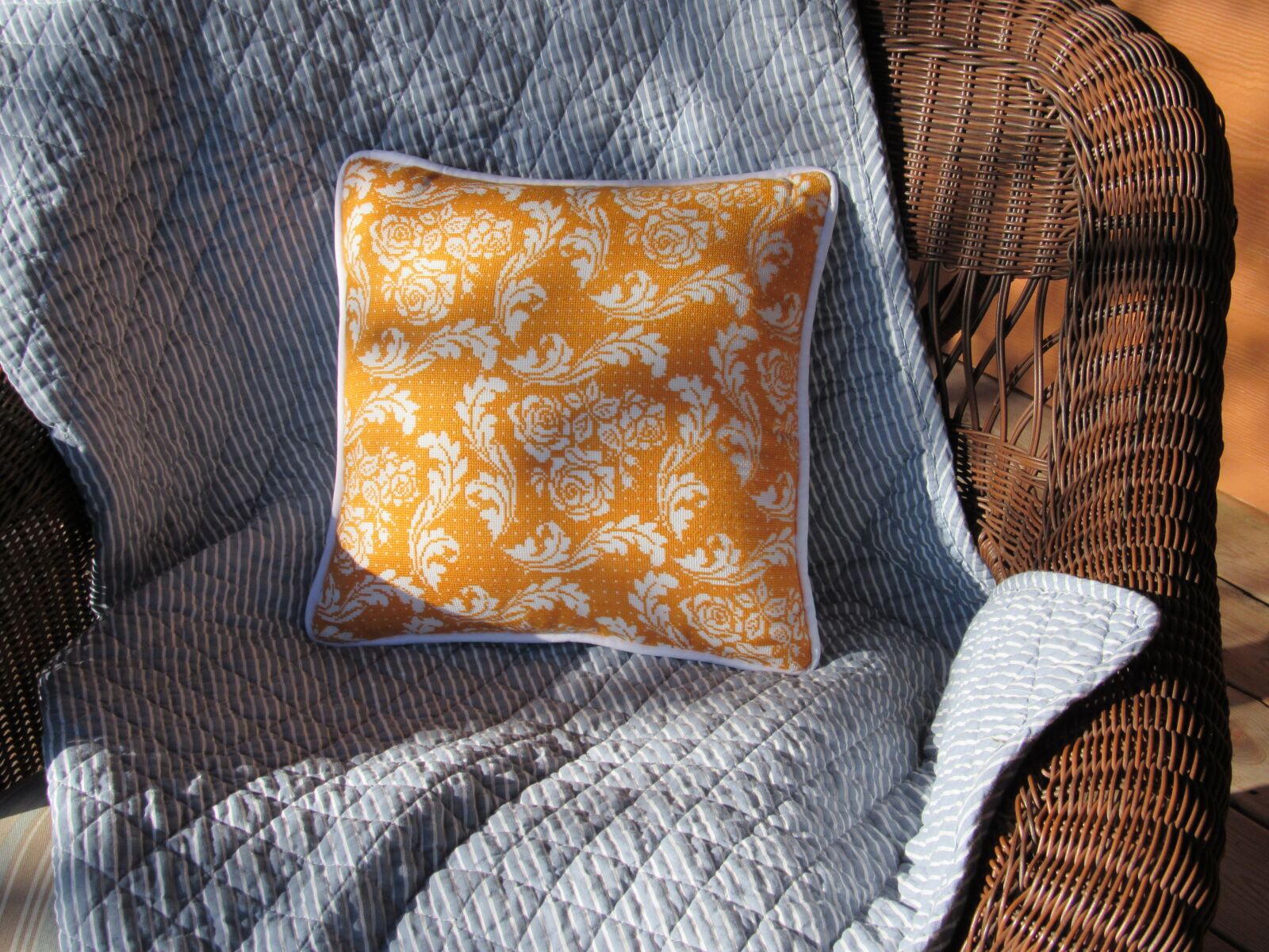 Canon PowerShot SX520 HS sample photo. Cross stitch, pillow, tangerine photography