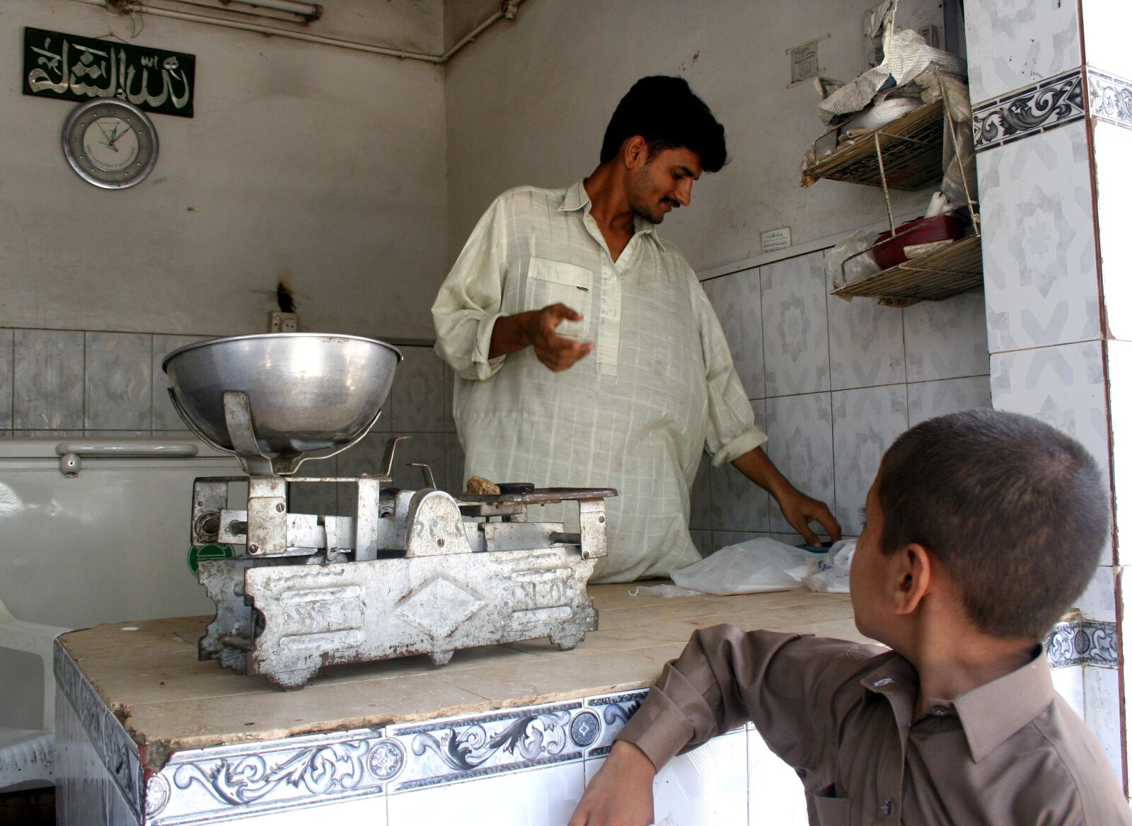 Canon EOS 20D sample photo. Milk, shop, workers, pakistan photography