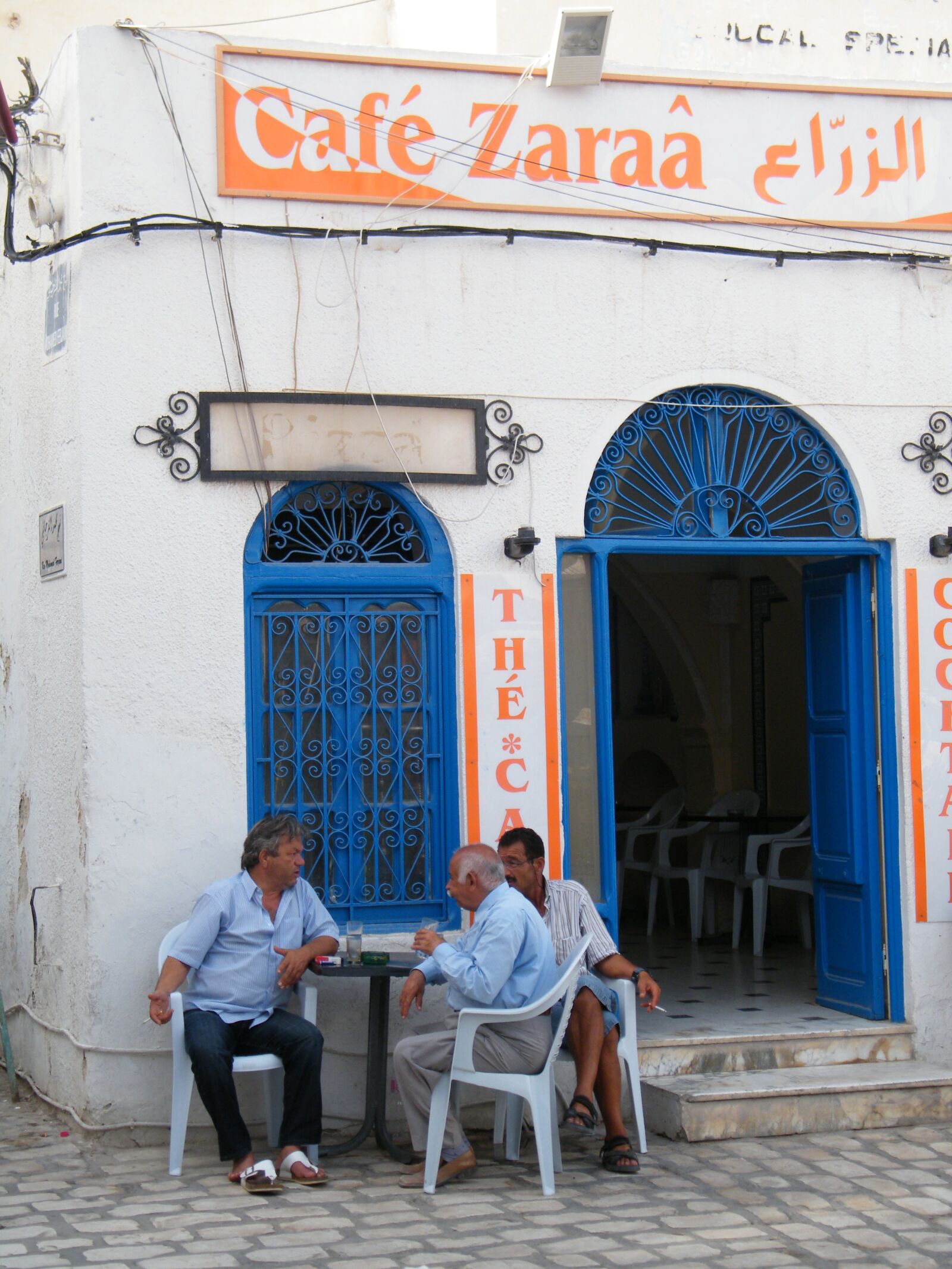 Fujifilm FinePix S2000HD sample photo. Tunisia, man, coffee photography