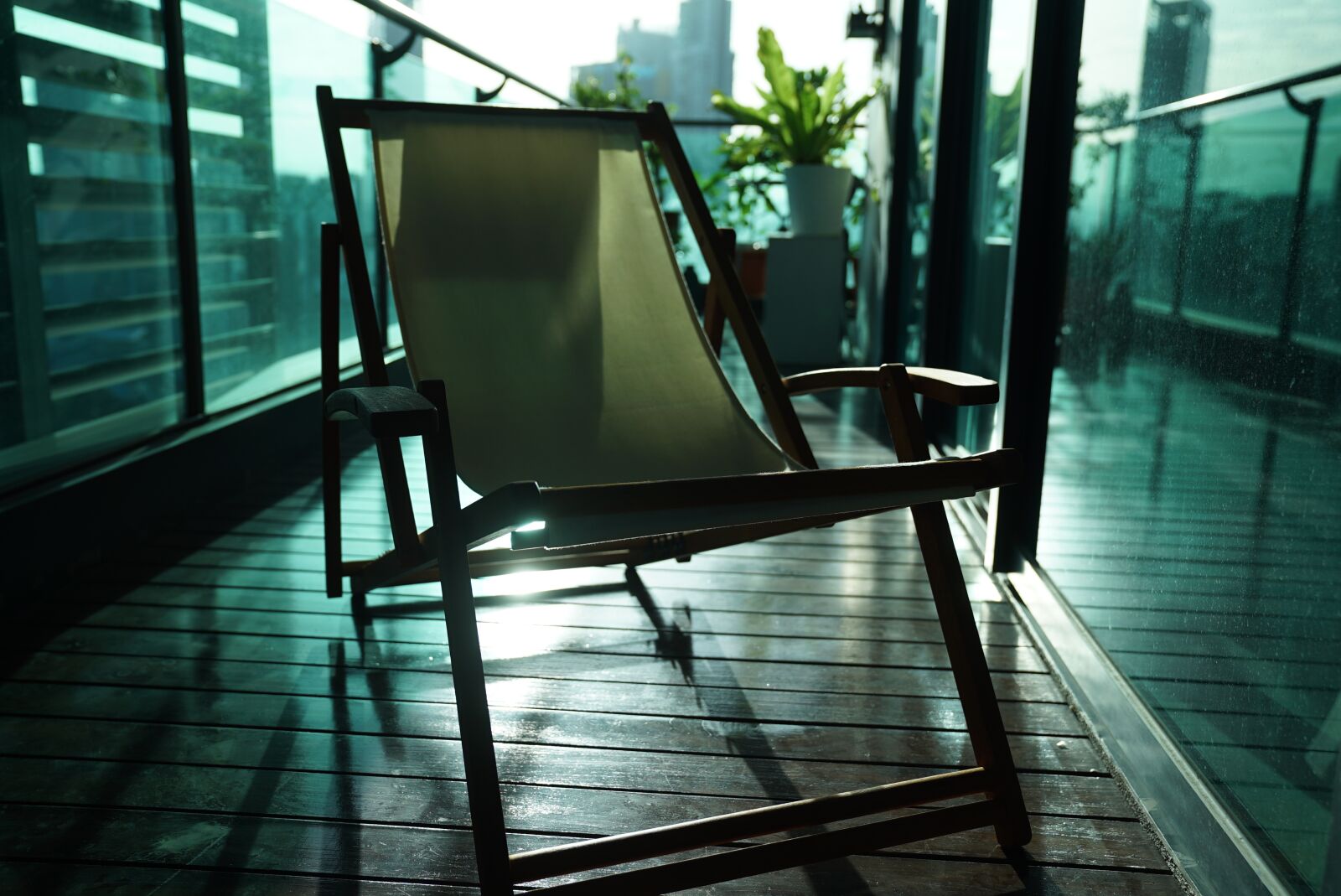 Sony a7S + Sony FE 24-70mm F2.8 GM sample photo. Lazy chair, canvas deck photography