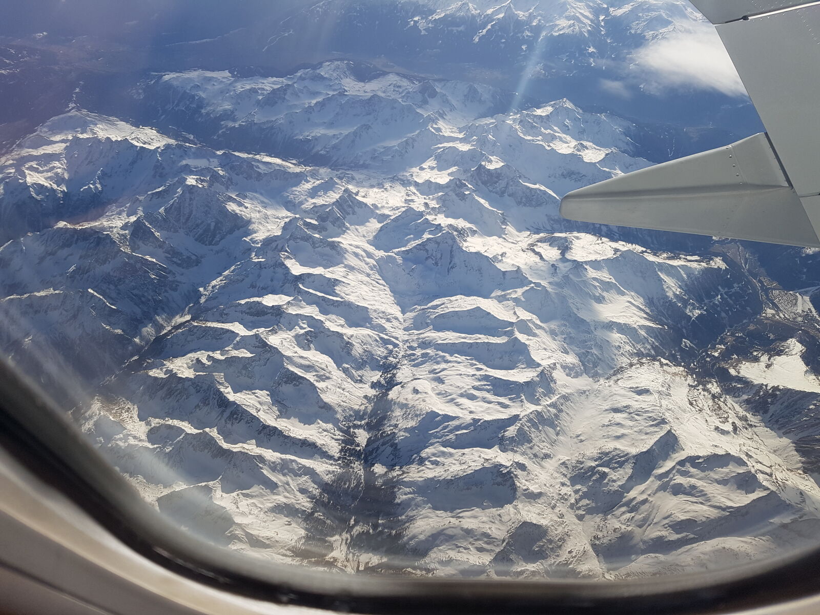 Samsung Galaxy S7 sample photo. On, airplane, above, mountains photography