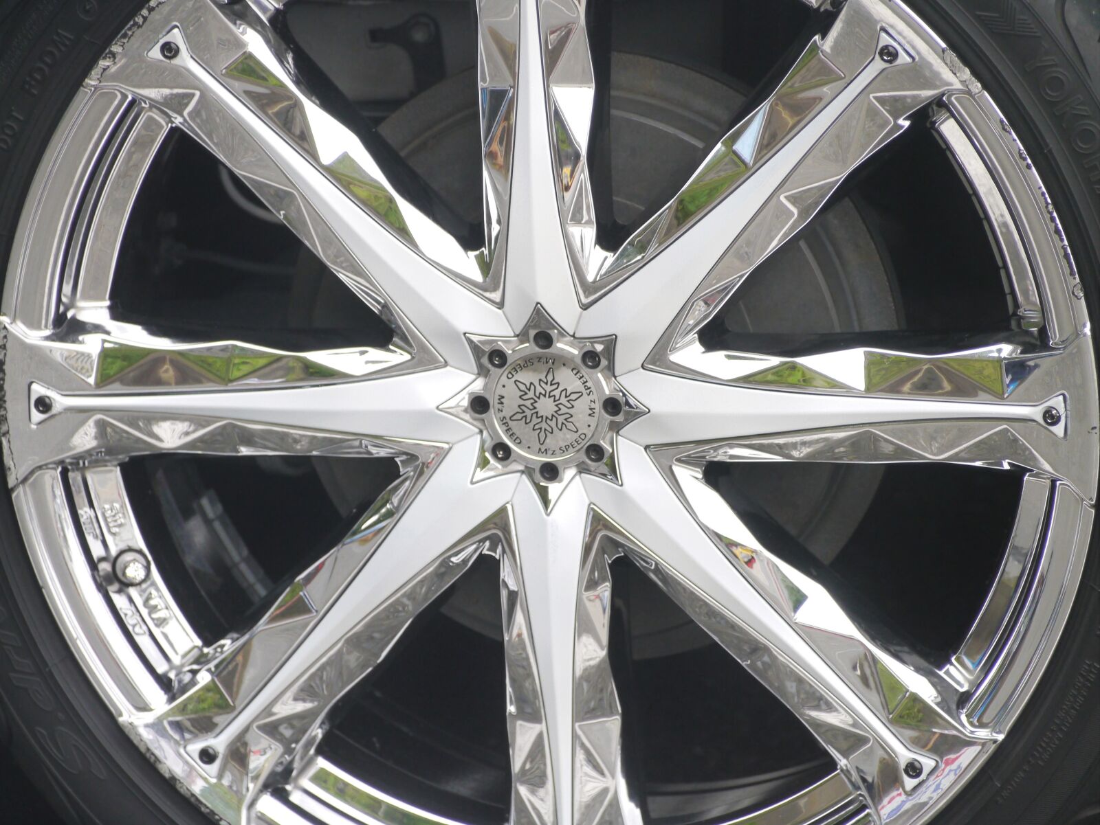 Panasonic Lumix DMC-GX1 sample photo. Car, wheel, radial photography