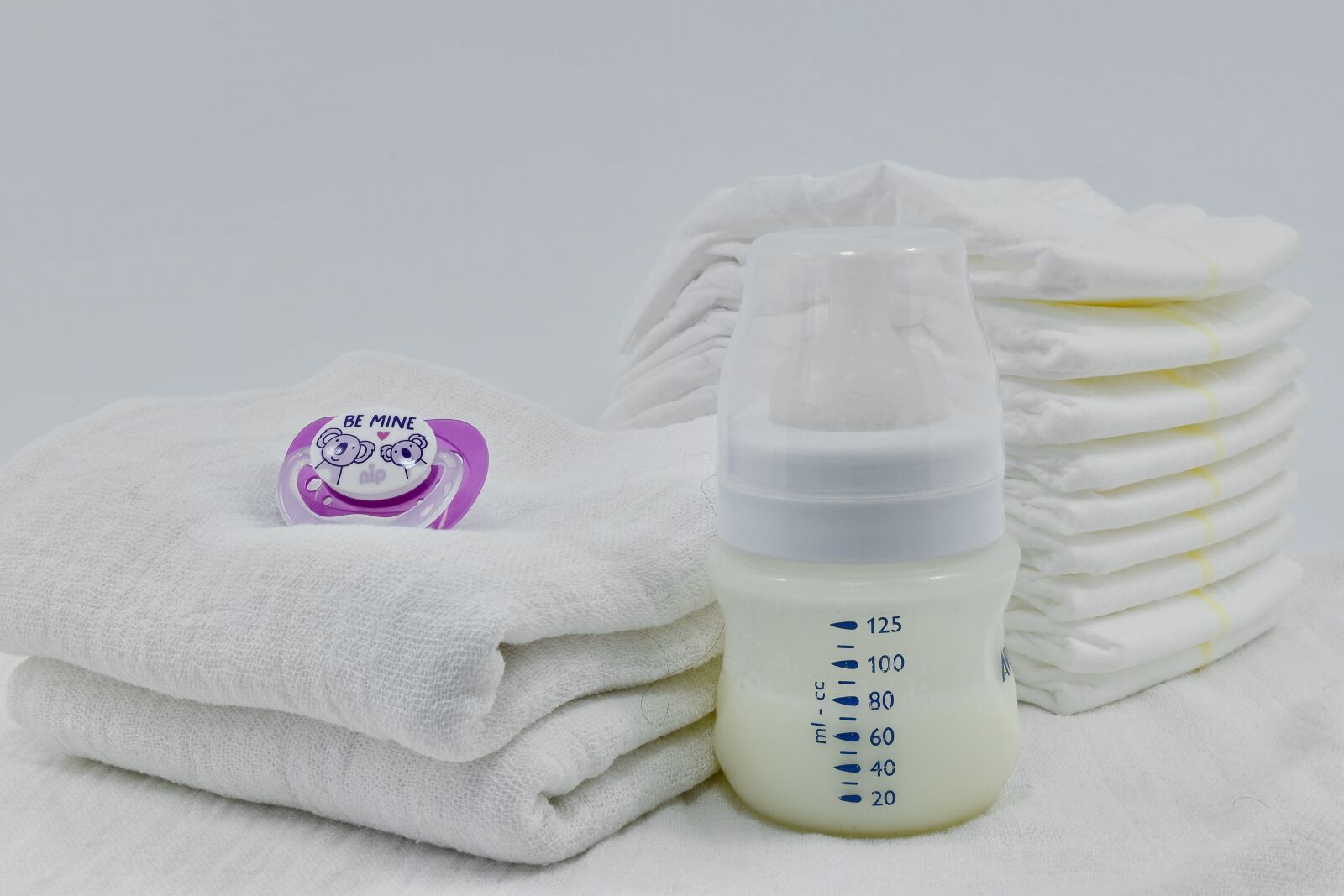 Nikon D5500 sample photo. Cotton, diaper, milk, newborn photography