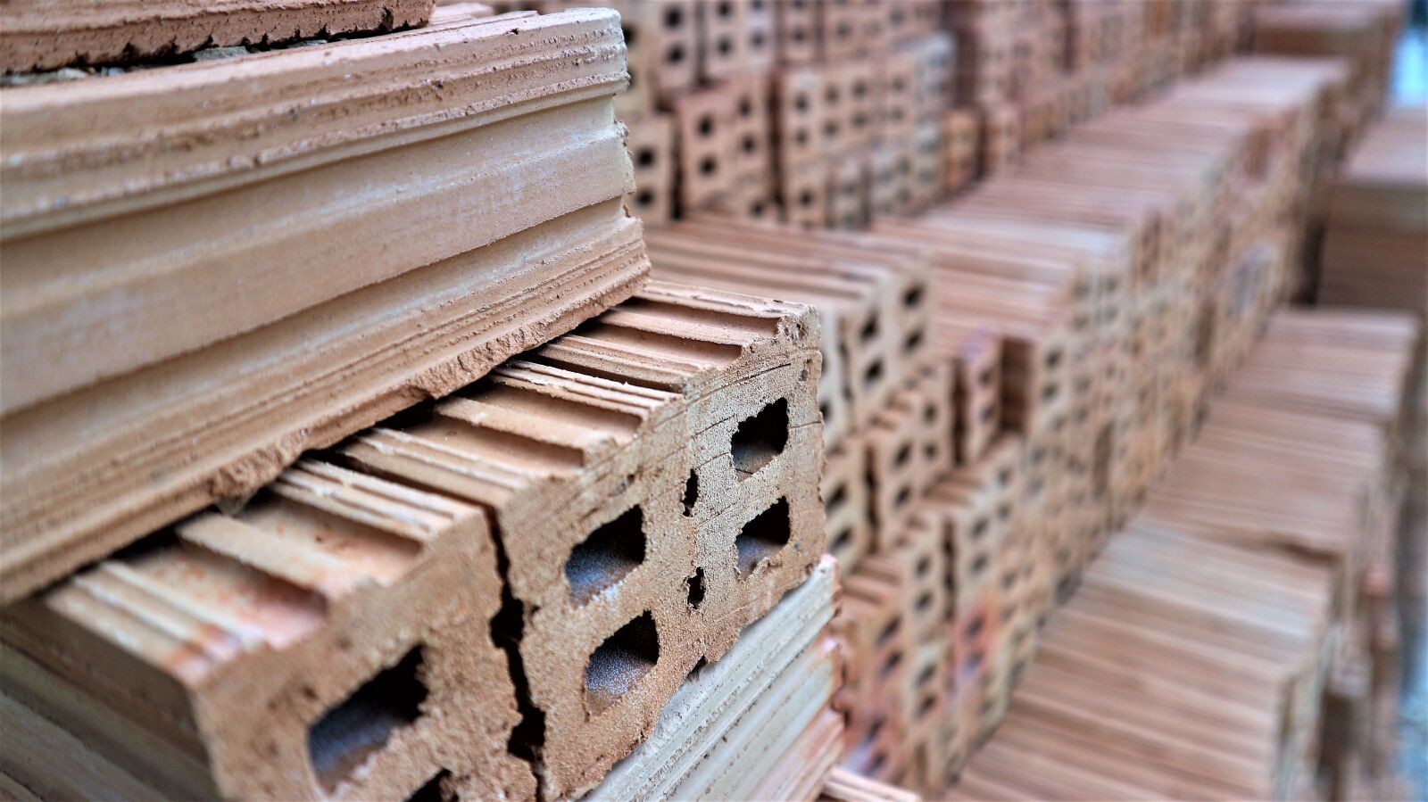 Canon EOS M10 sample photo. Bricks, rock, wall photography
