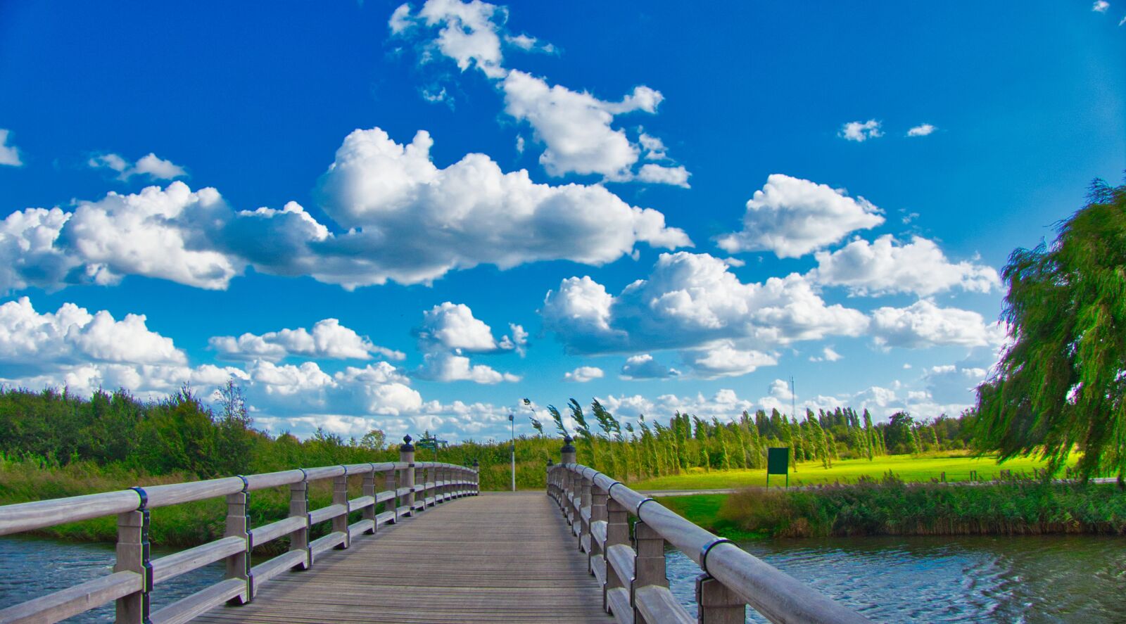 Panasonic Lumix DMC-FZ300 sample photo. Air, clouds, bridge photography