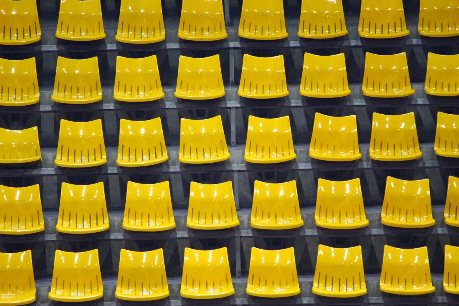 Canon EF-S 55-250mm F4-5.6 IS STM sample photo. Yellow, chair, seats photography