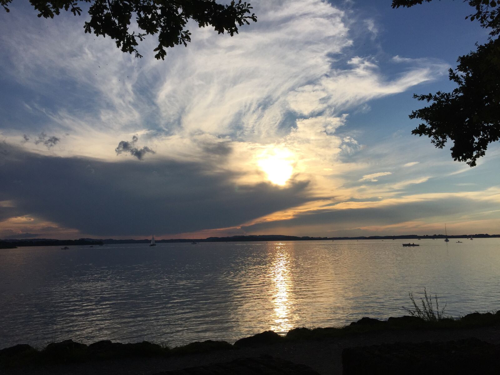 iPhone 6 back camera 4.15mm f/2.2 sample photo. Chiemsee, clouds, bernau photography