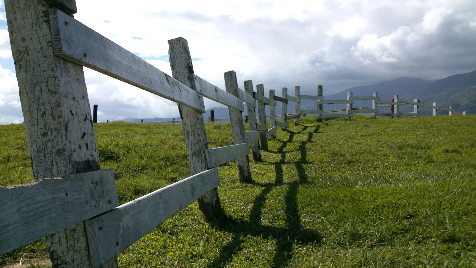 Sony Xperia P sample photo. Railing, cloud, grassland photography
