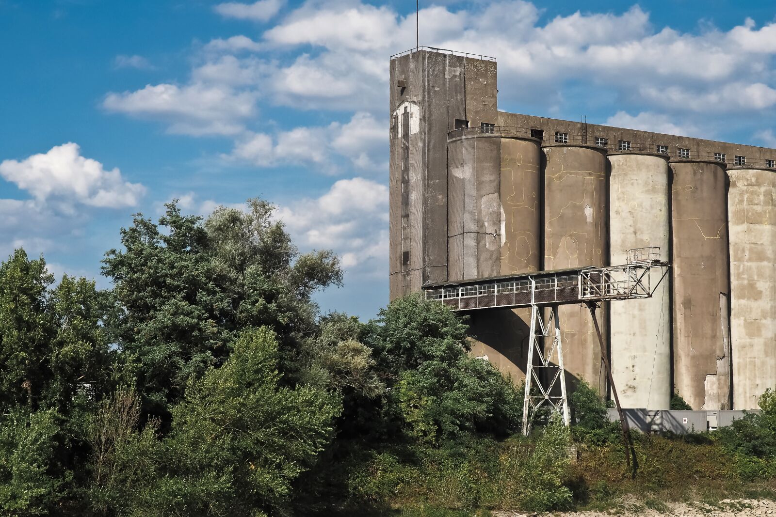 Olympus OM-D E-M10 sample photo. Lost places, silo, broken photography