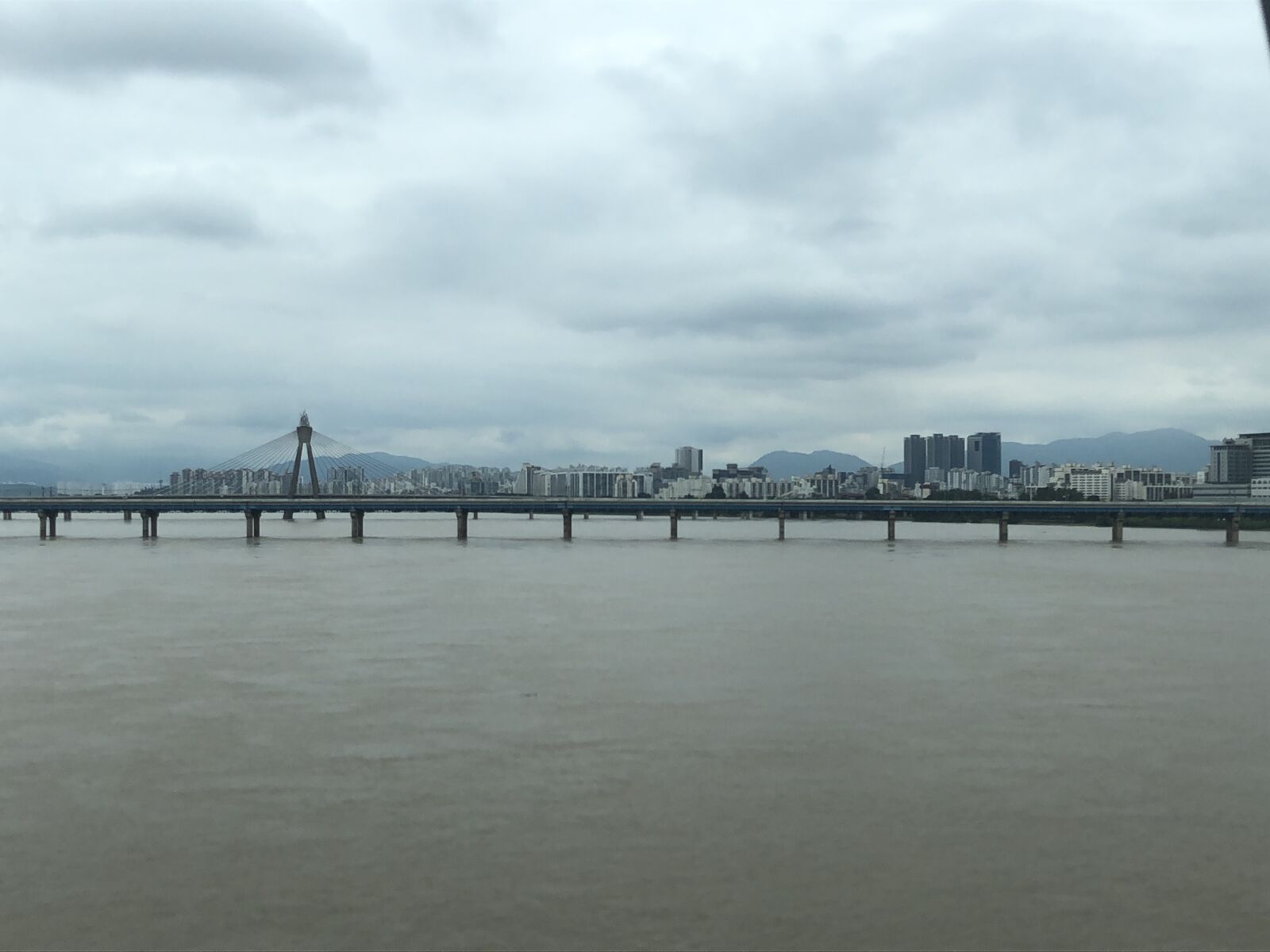 Apple iPhone 8 sample photo. Rain, cloudy, river photography