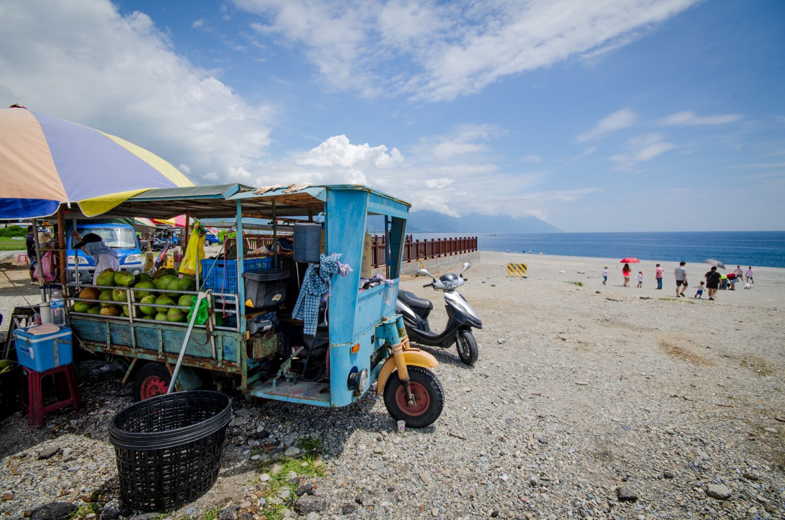 Nikon D7000 sample photo. Selling coconuts, blue van photography