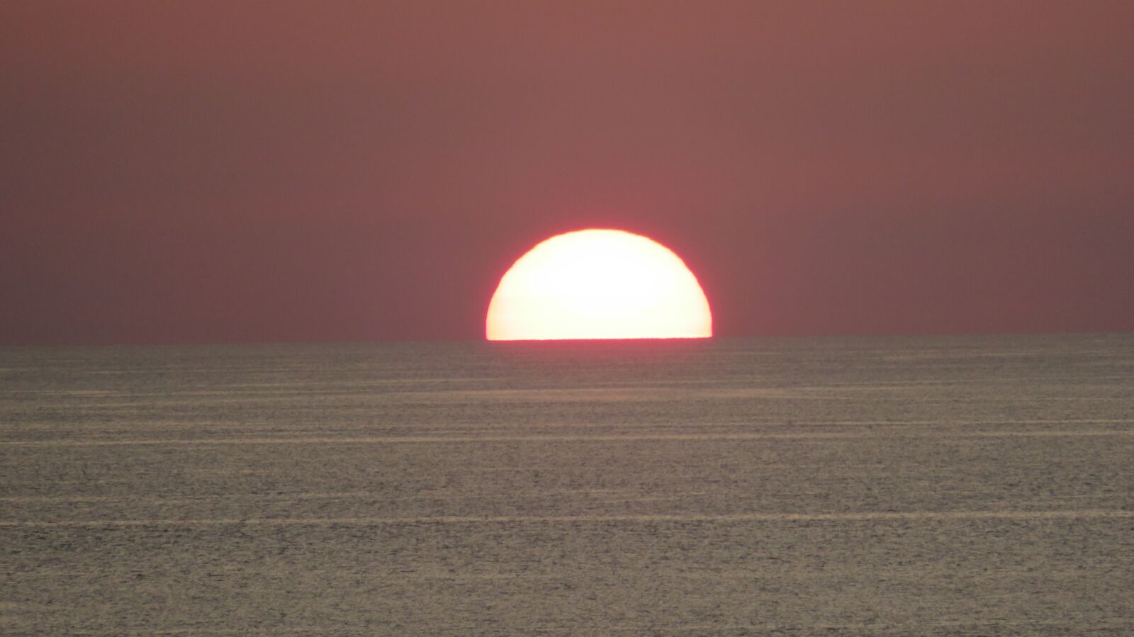 Canon PowerShot SX720 HS sample photo. Earth hour, sun, sea photography
