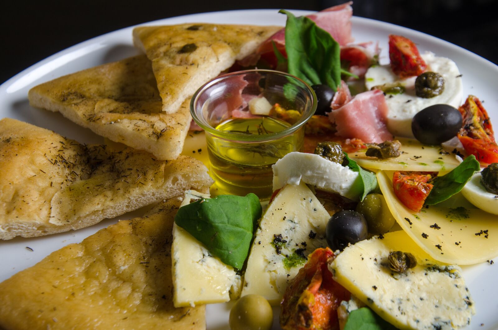 Nikon D7000 sample photo. Foccacia with olives, tasting photography