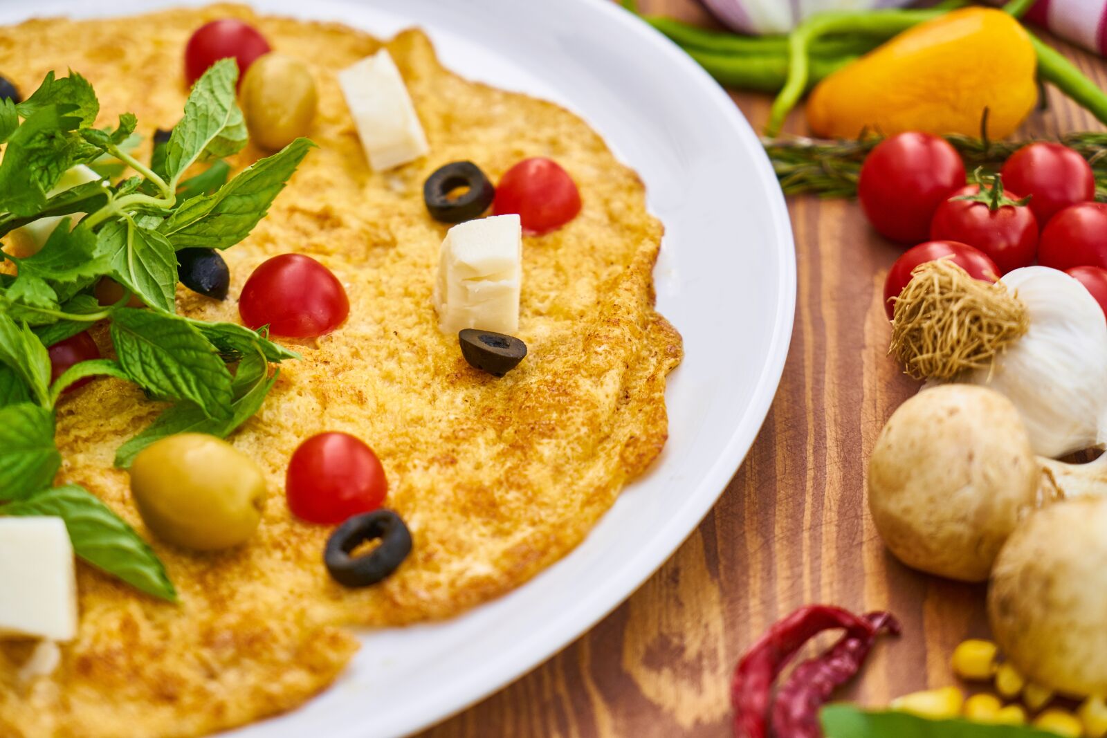 Sony a7R II sample photo. Omelet, yellow, egg photography