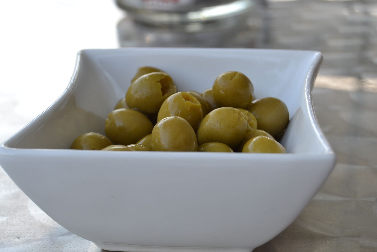 Nikon D3100 sample photo. Olives, appetizer, oil photography