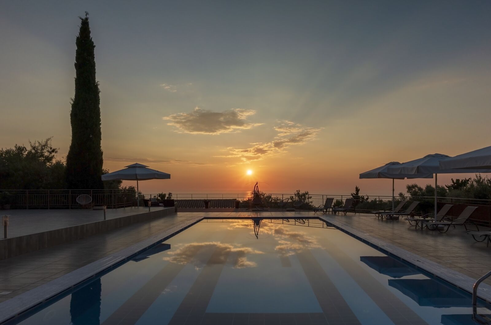 Nikon D750 sample photo. Hotel, pool, sunset photography