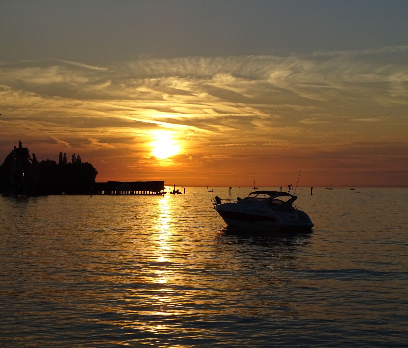 Sony Cyber-shot DSC-HX400V sample photo. Lake sunset, boat on photography