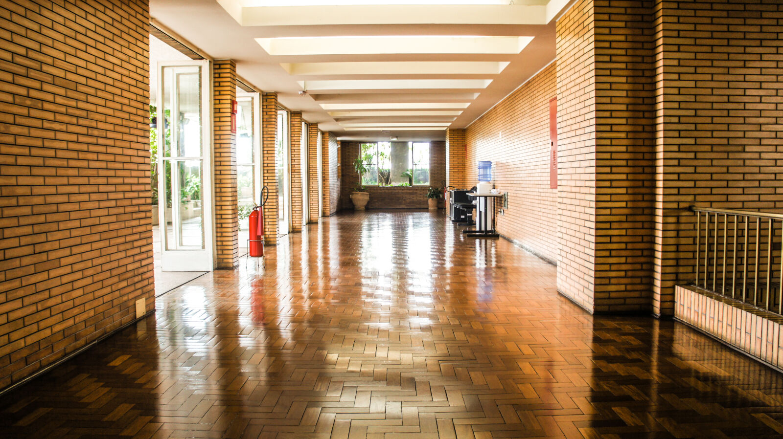 Sony Alpha NEX-3 + Sony E 18-55mm F3.5-5.6 OSS sample photo. Brown, wooden, flooring, hallway photography